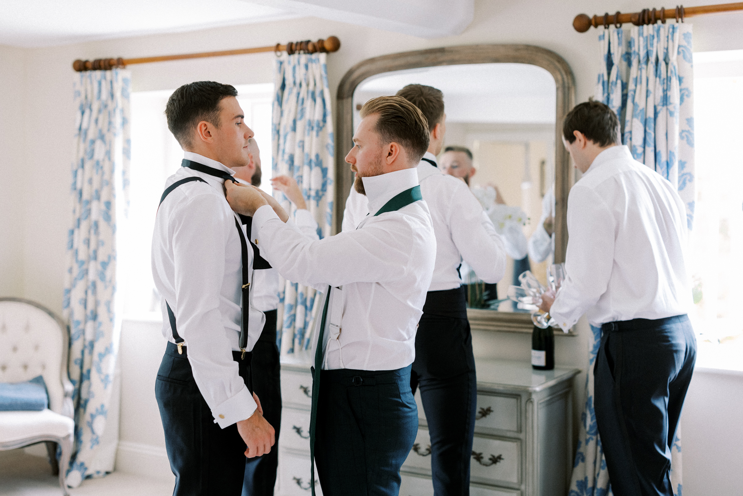 Groom getting ready for luxury wedding at Somerley House