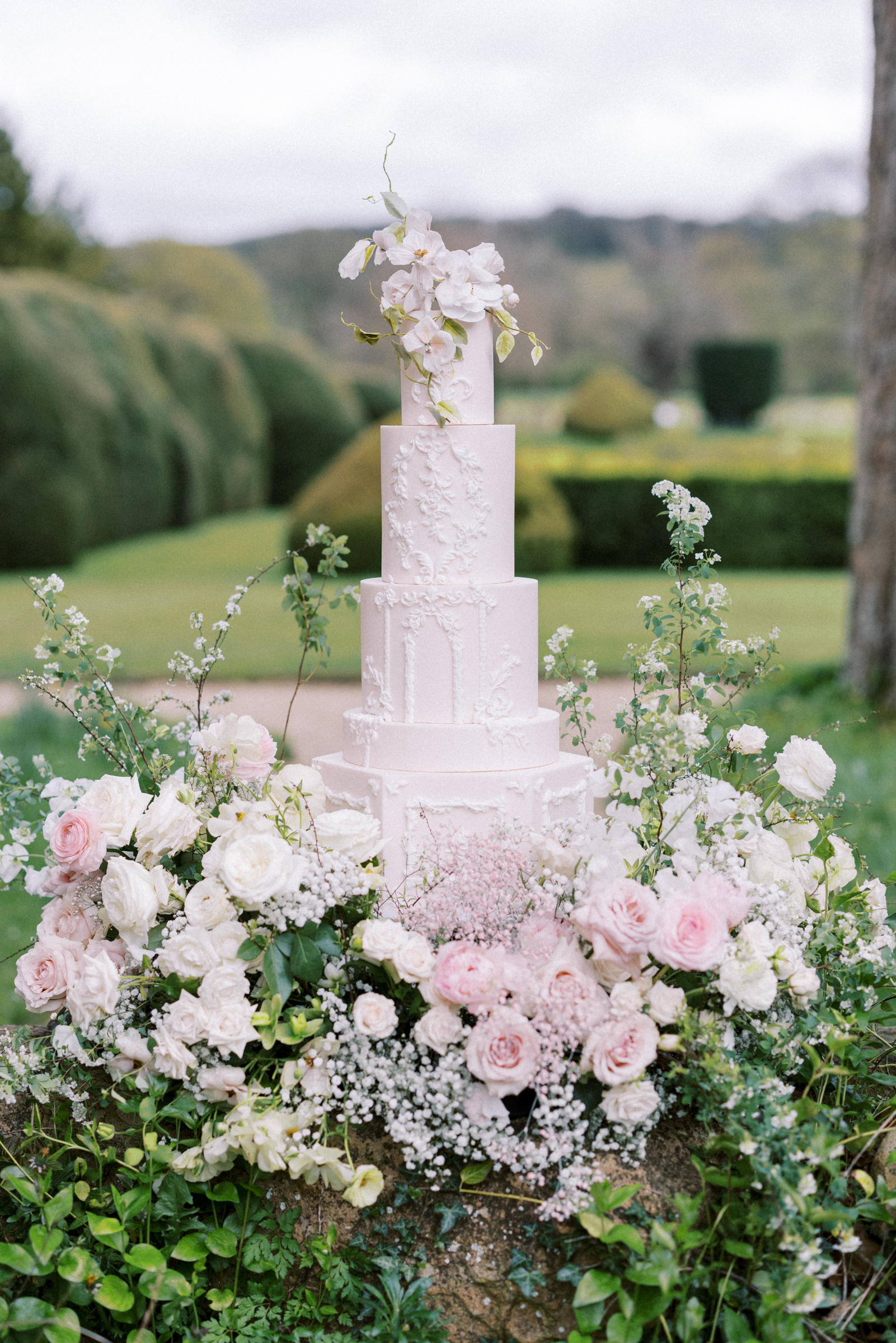 Gorgeous White and Pink wedding cake tower at luxury Sudeley Castle Wedding in the Cotswolds