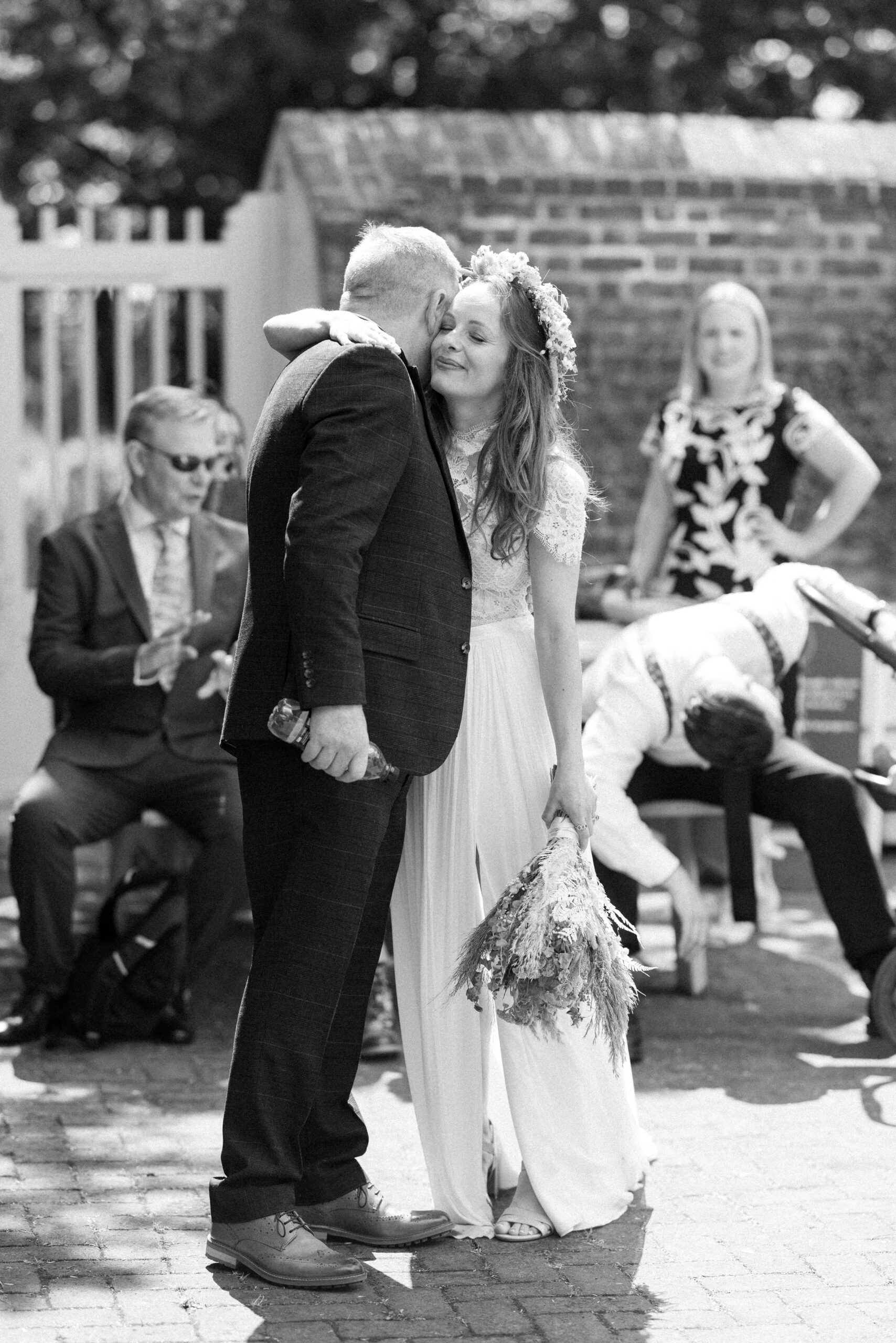 Bride embraces her dad at Morden Park House Wedding