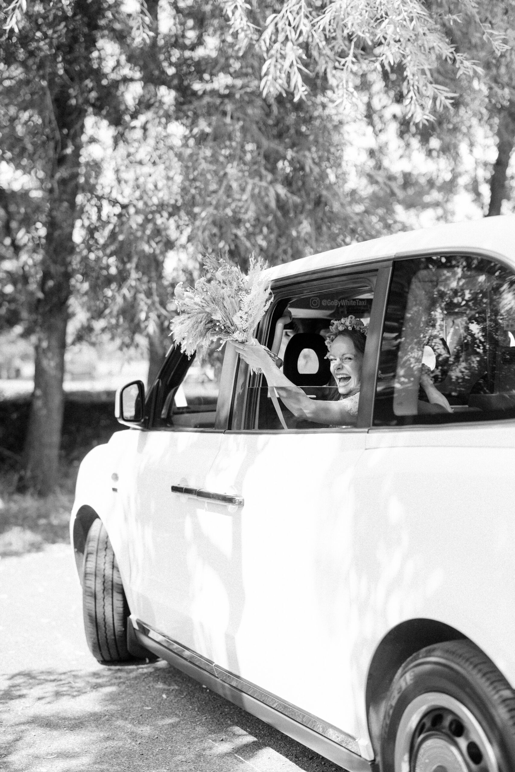 Bride exists Morden Park House Wedding in London cab