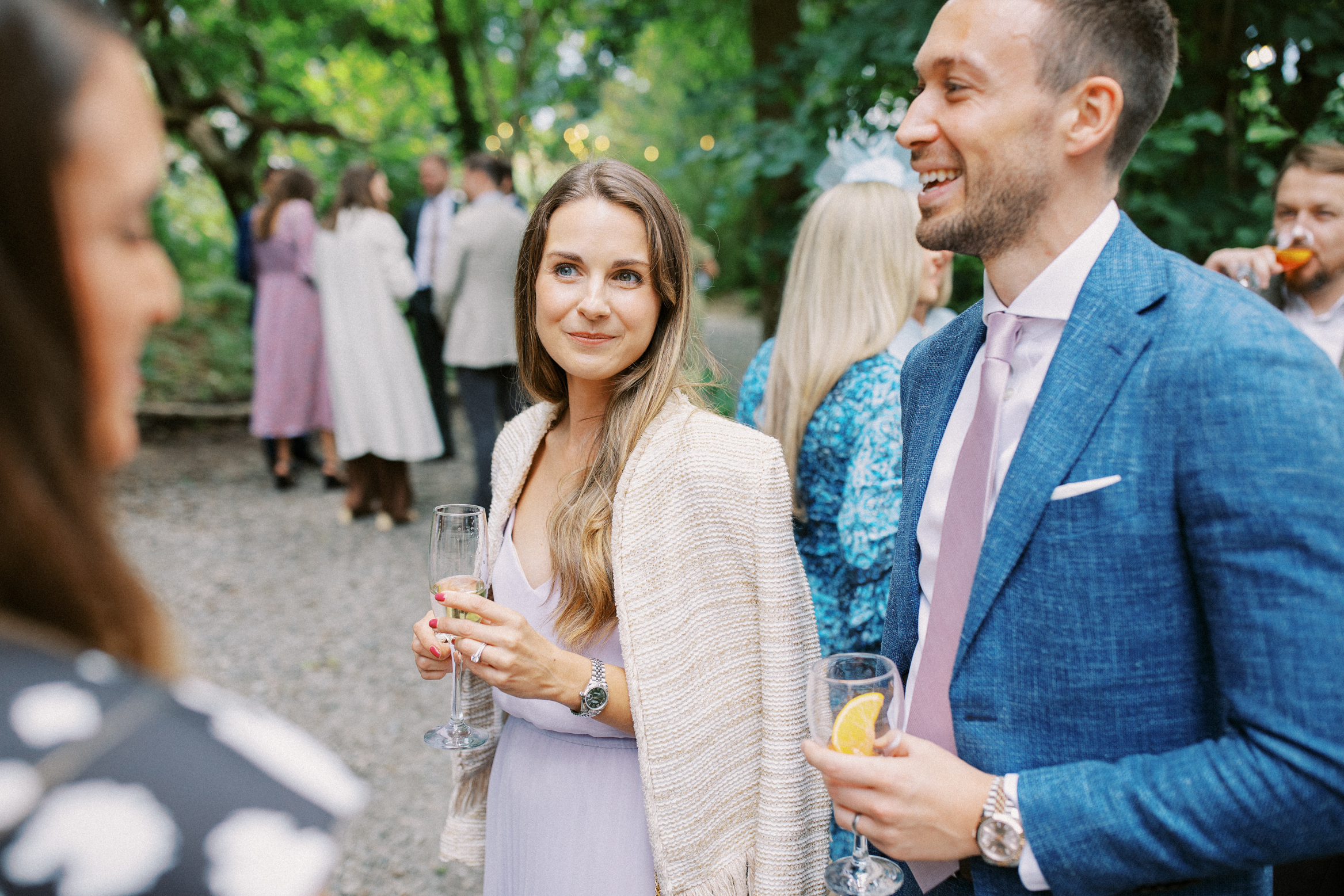 Candid wedding photography of guests mingling at Wilderness Reserve in Kent