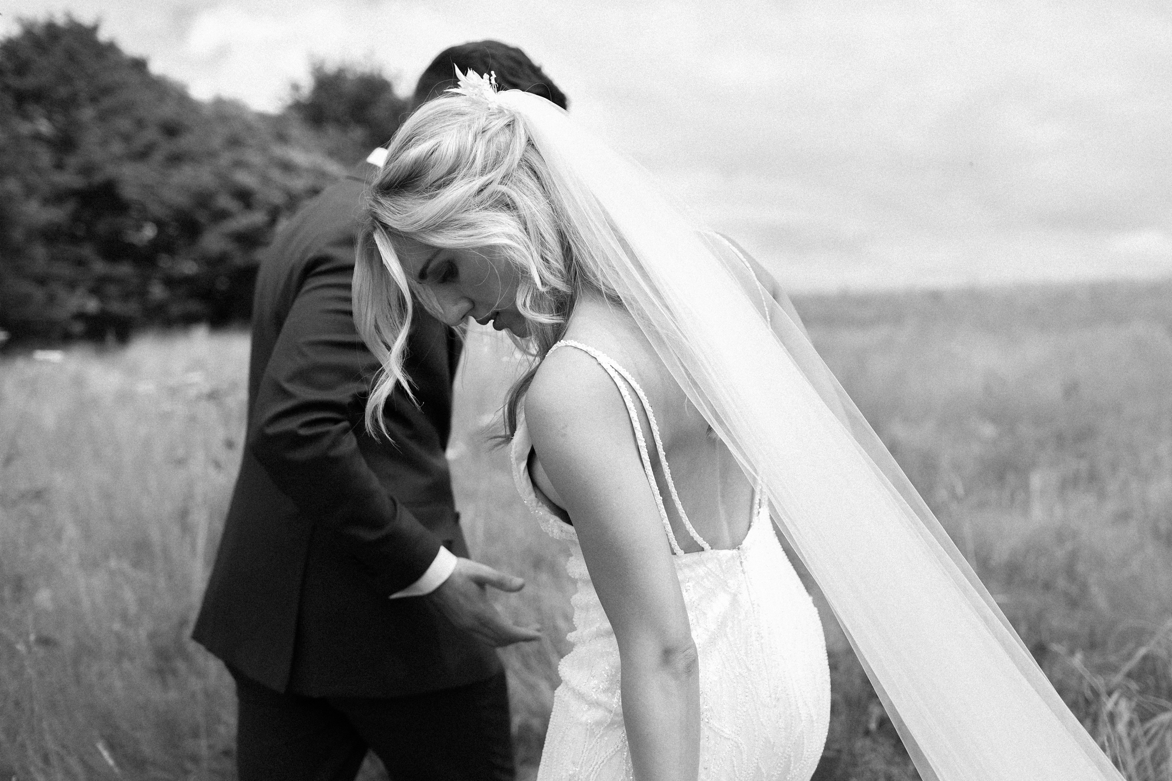 Documentary wedding photography of bride and groom at their festival themed wedding at The Wilderness Reserve in Kent