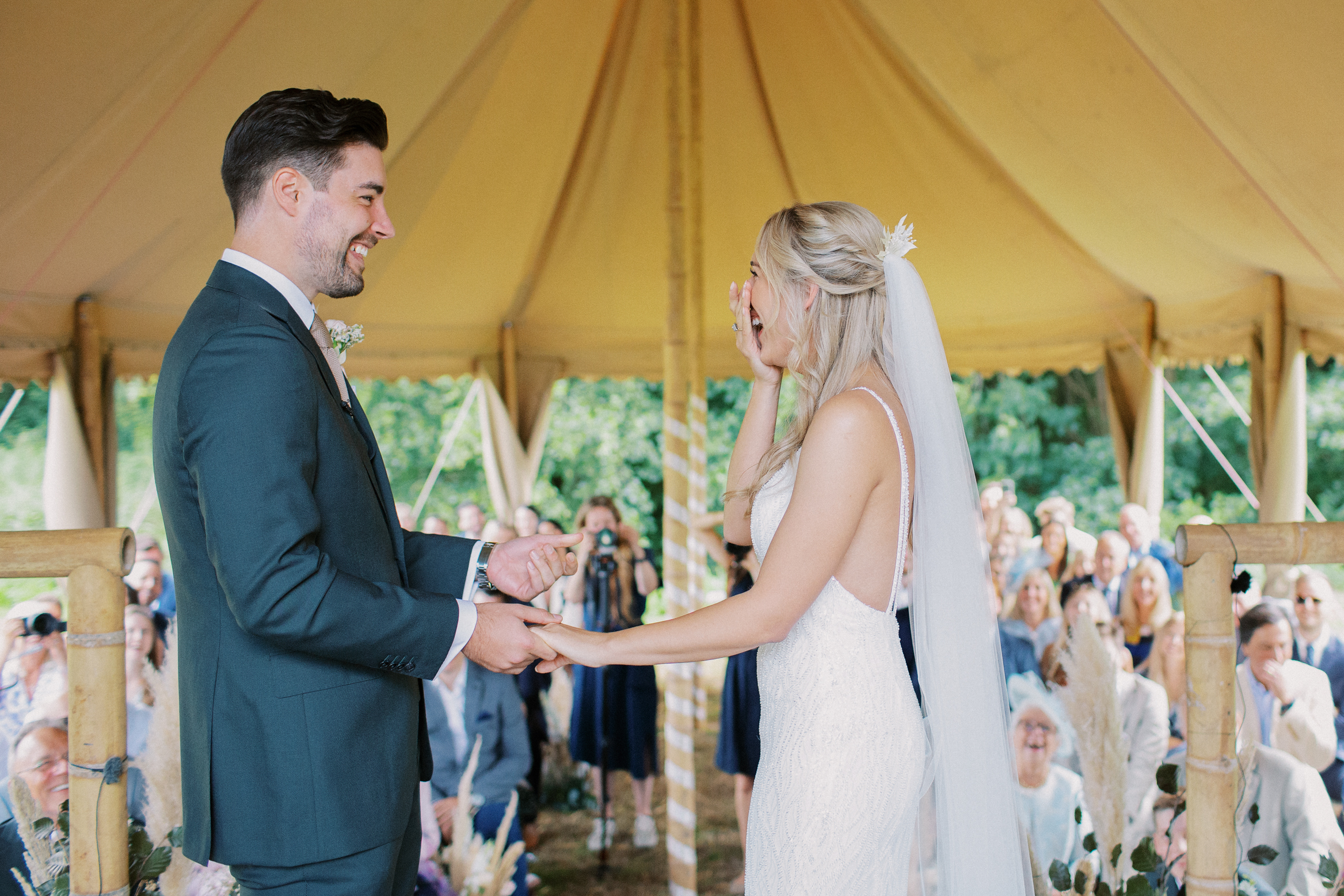 Kent wedding photography of ride and groom getting married at their festival themed Wilderness Weddings