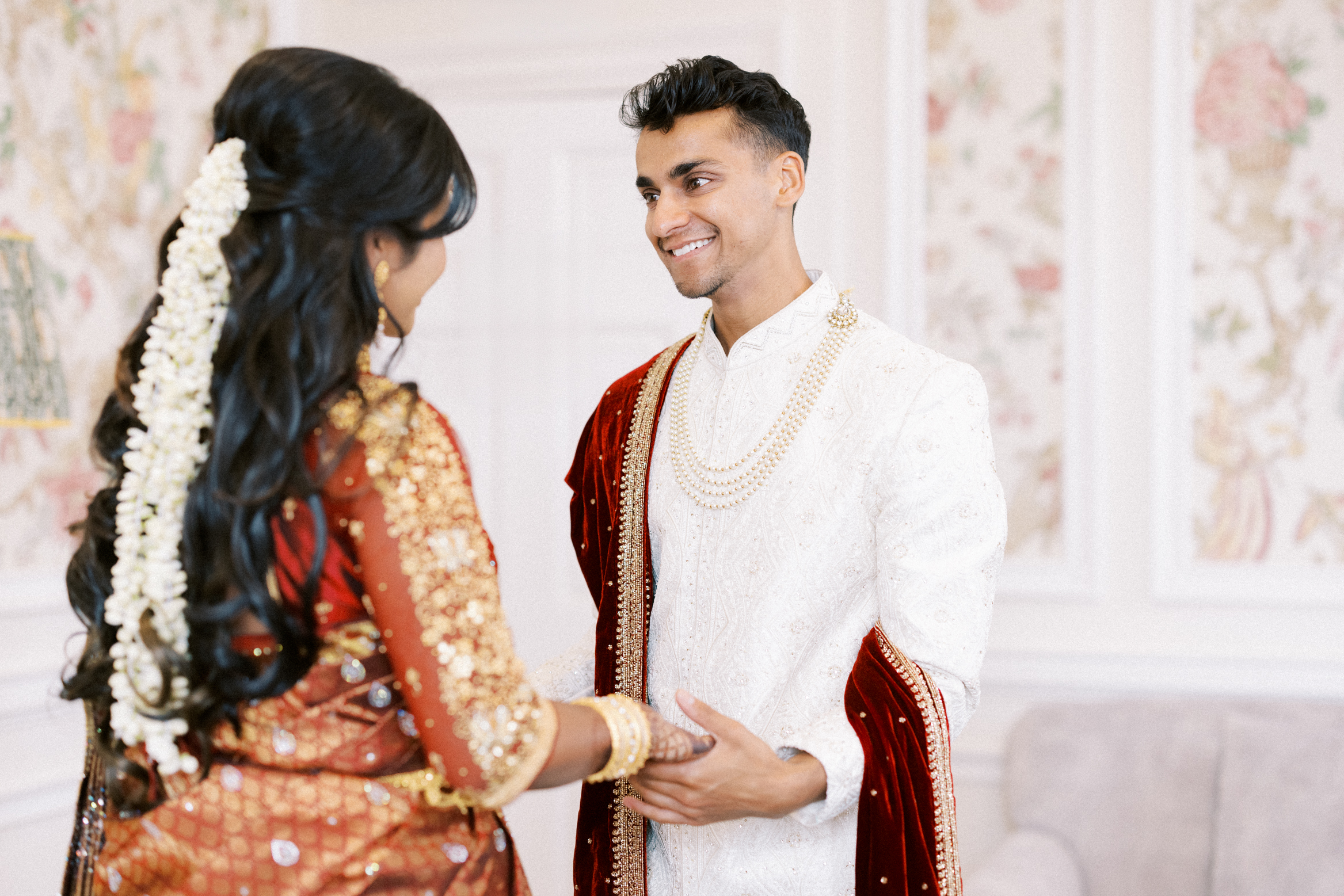 Groom sees his bride for the first time one the bridal suite at Hedsor House