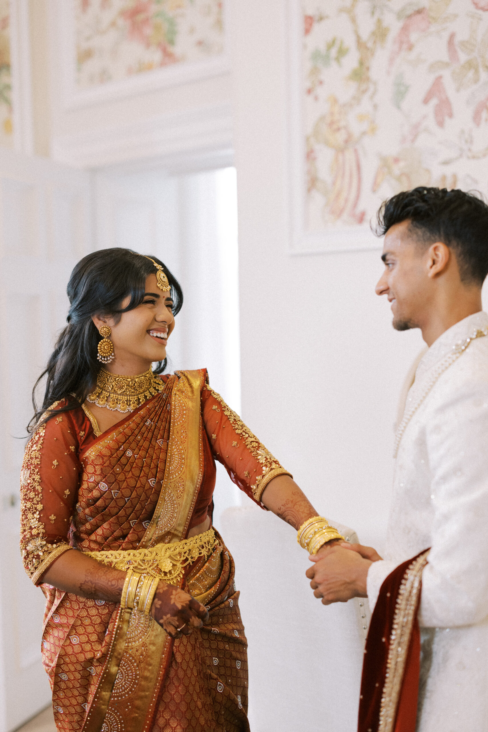 Bride and groom see each other before the ceremony at Hedsor House