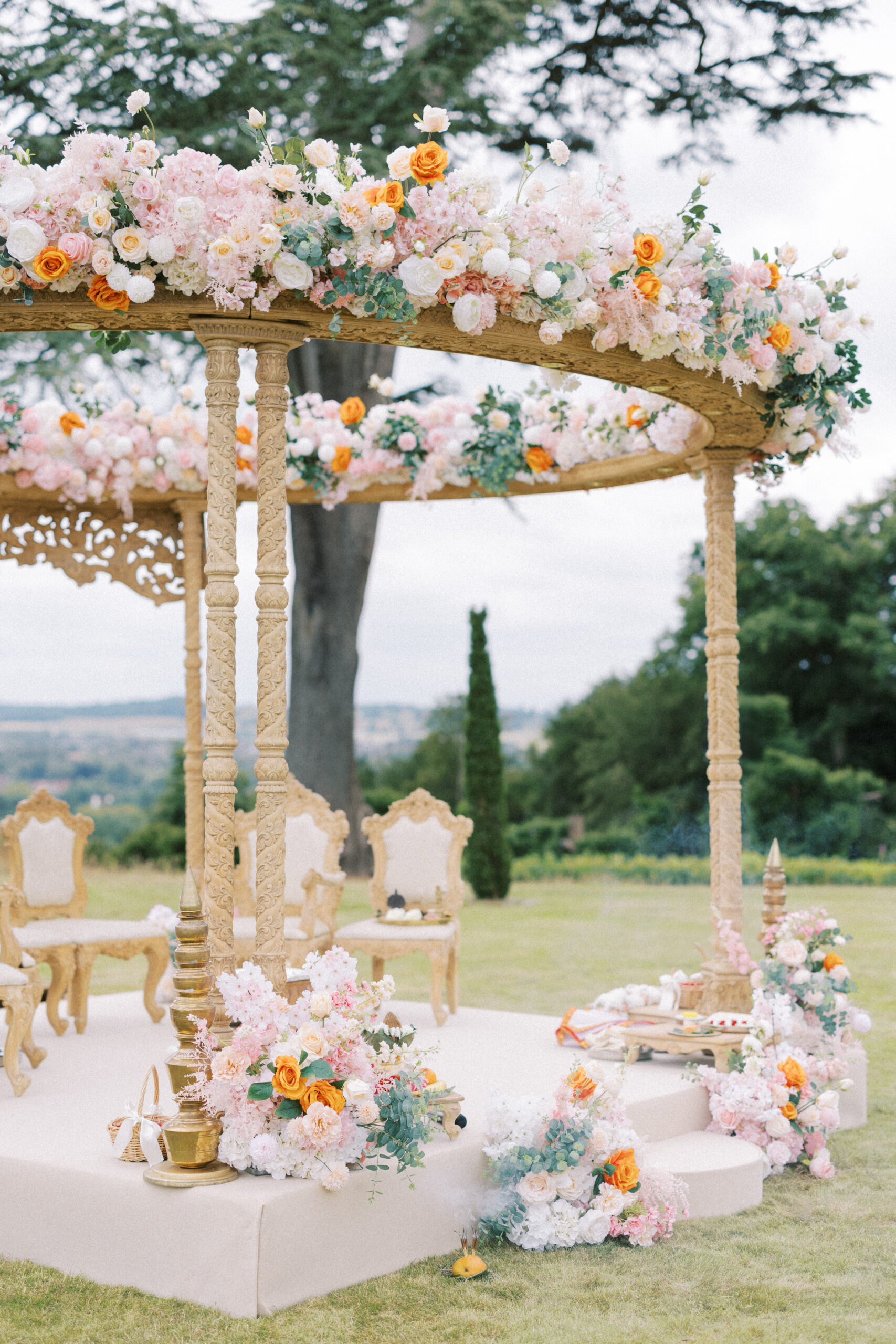 Beautifully decorated Indian mandap for Indian wedding at Hedsor House