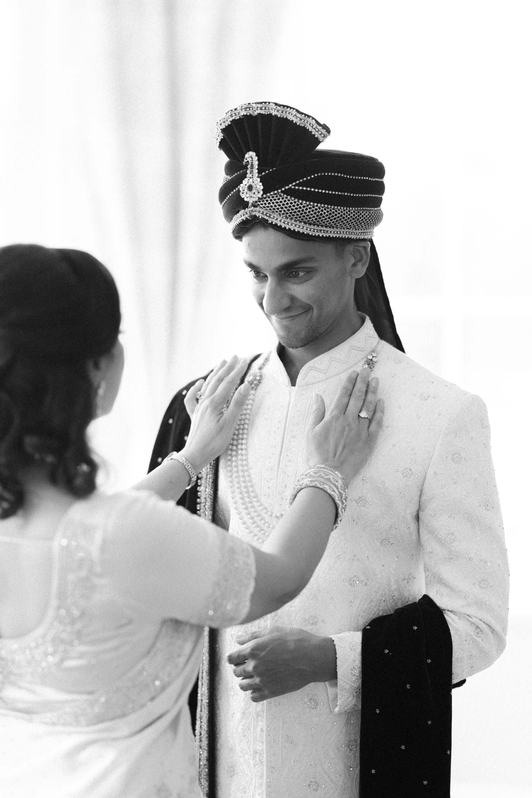 Indian groom getting ready for his wedding at Burnham Beeches Hotel