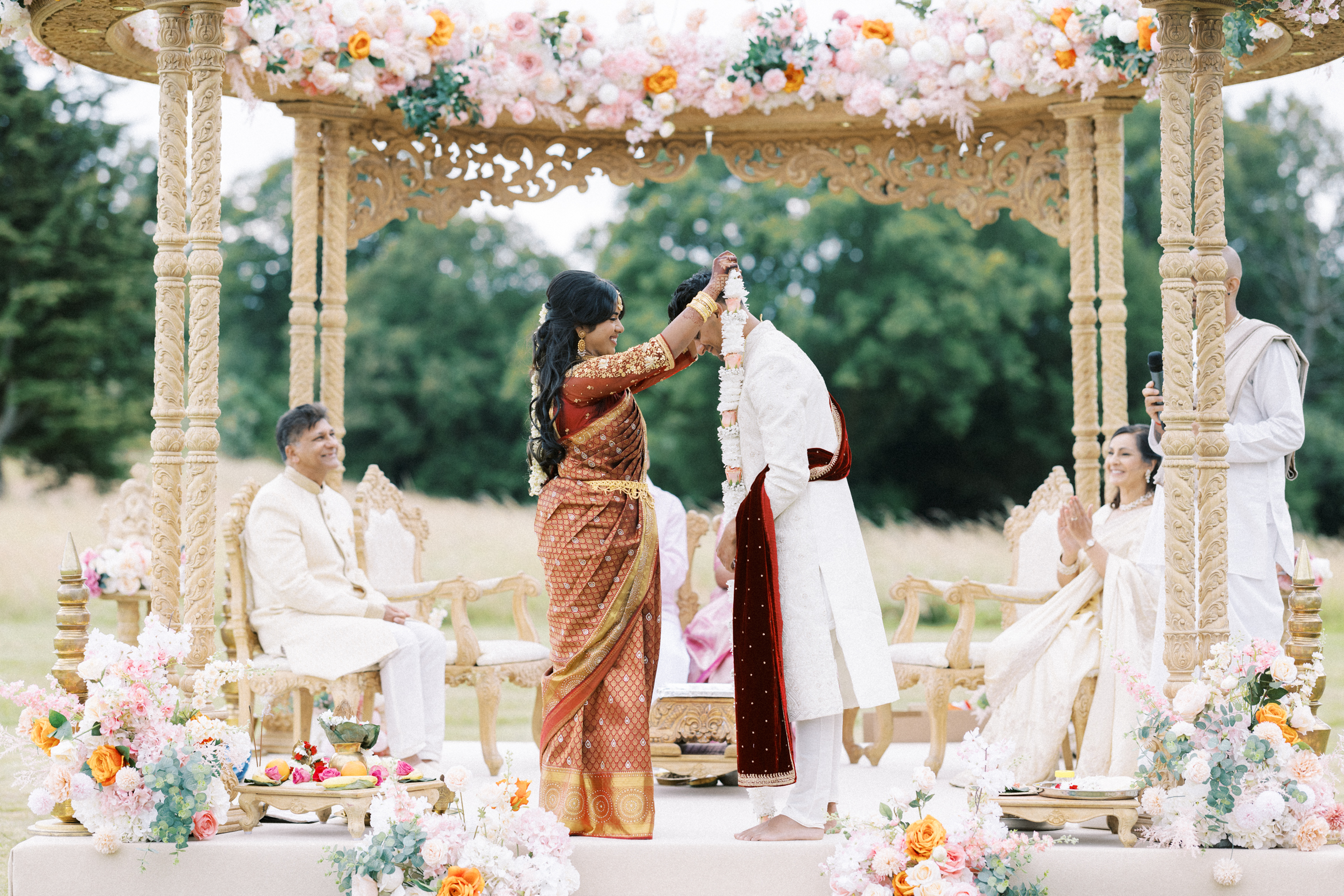 Beautiful Indian wedding under Indian mandap captured by Gemma Vaughan Photography at Hedsor House in Buckinghamshire