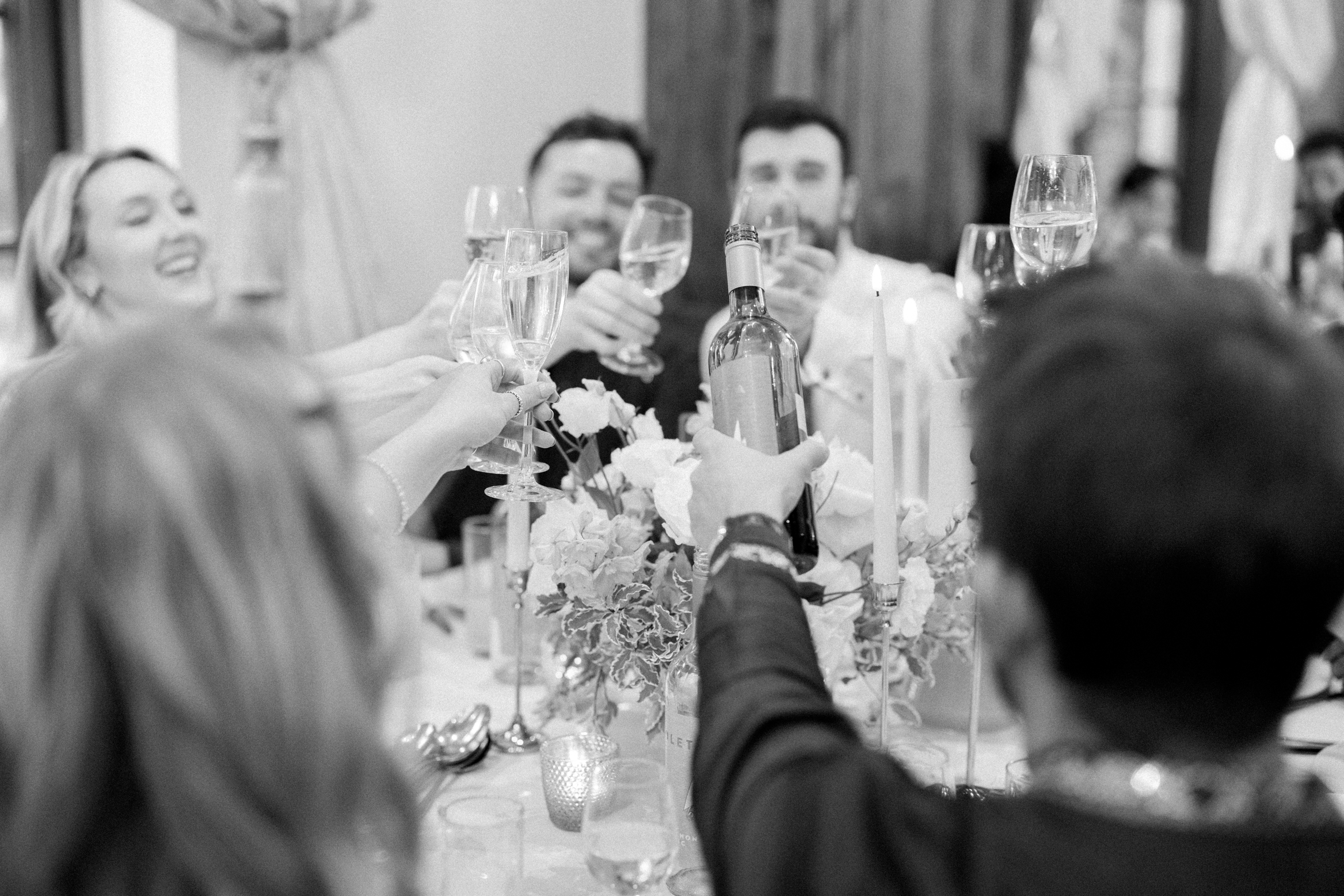 Guests cheer in the ballroom at Hedsor House