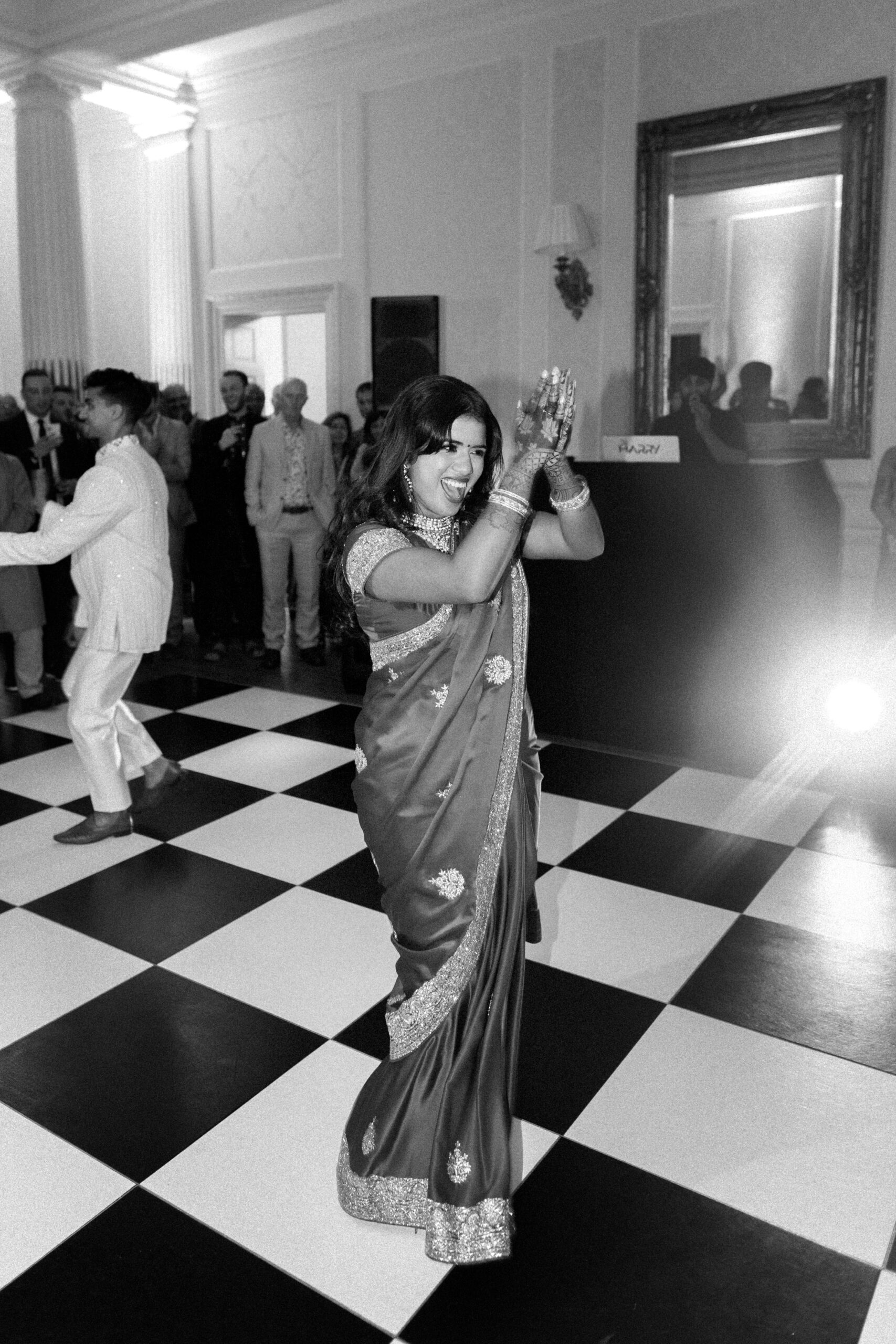 Bride dances on her wedding day at Hedsor House