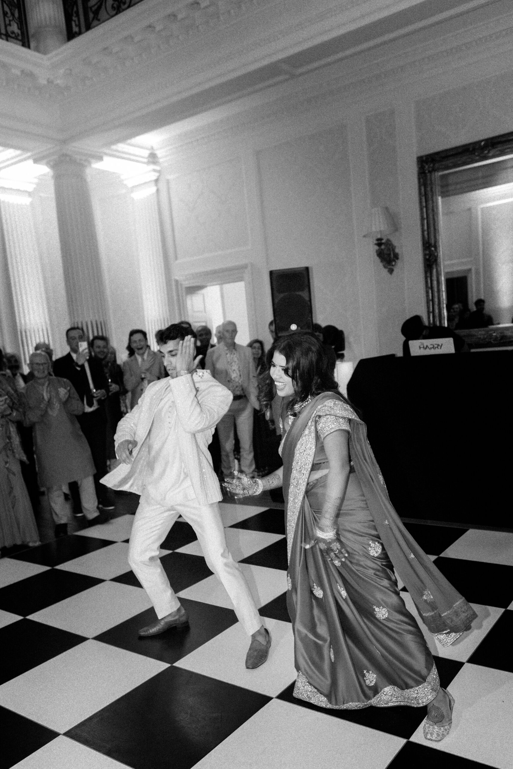 Bride and groom dance at their Indian wedding at Hedsor House