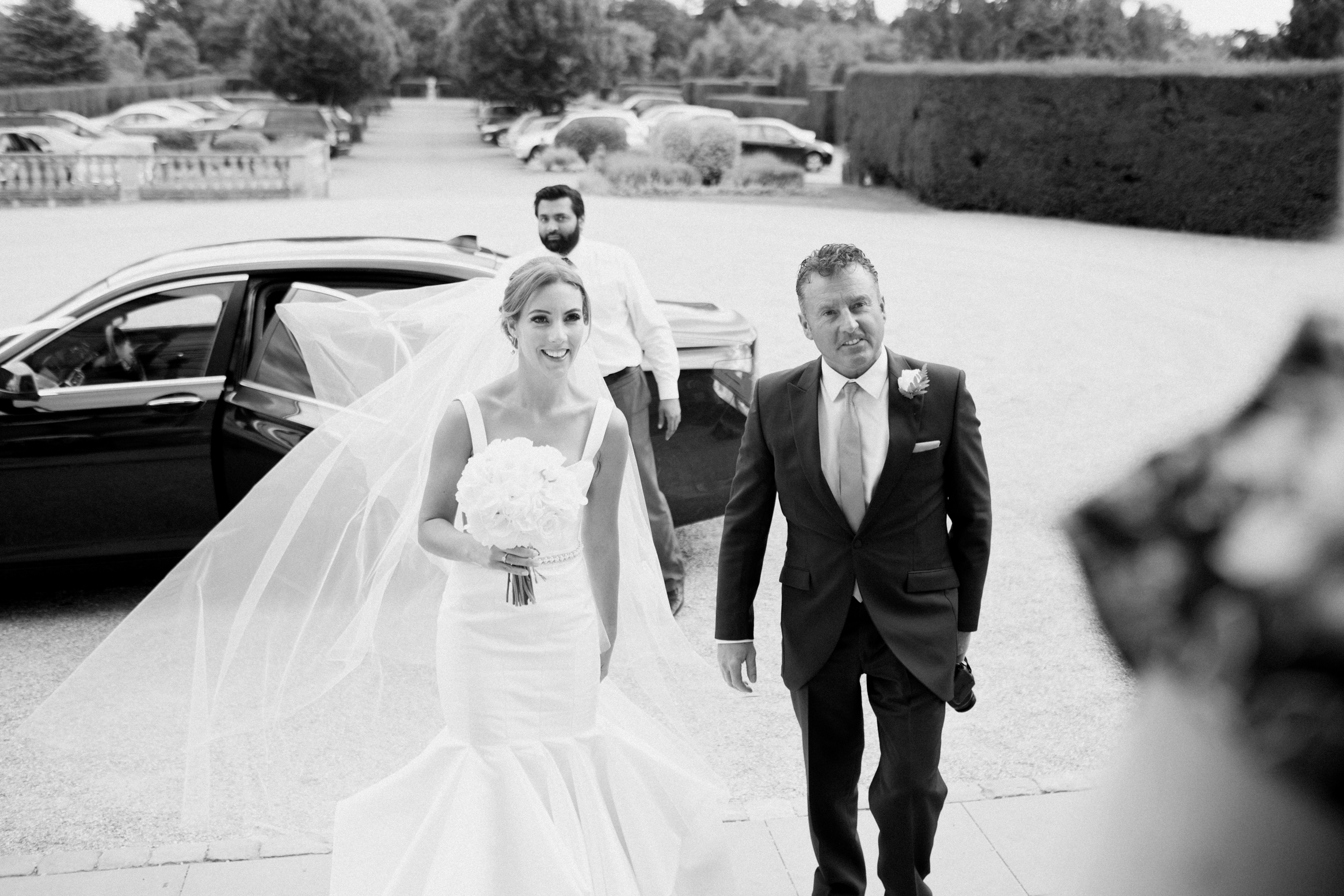 Bride arrives for her wedding at Hedsor House in Buckinghamshire