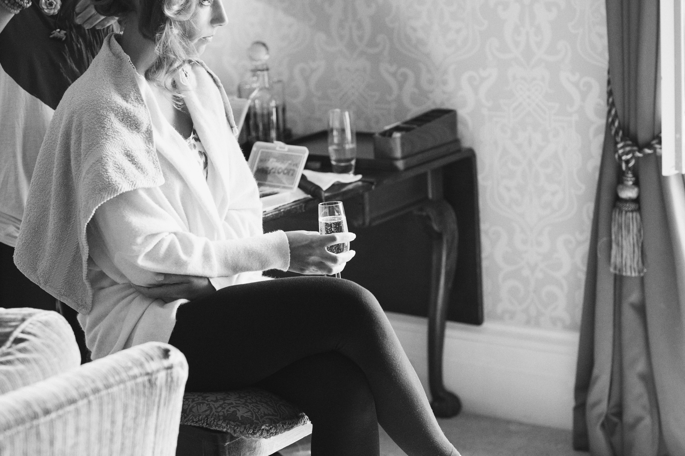 Bride getting ready in Cliveden House's bridal suite