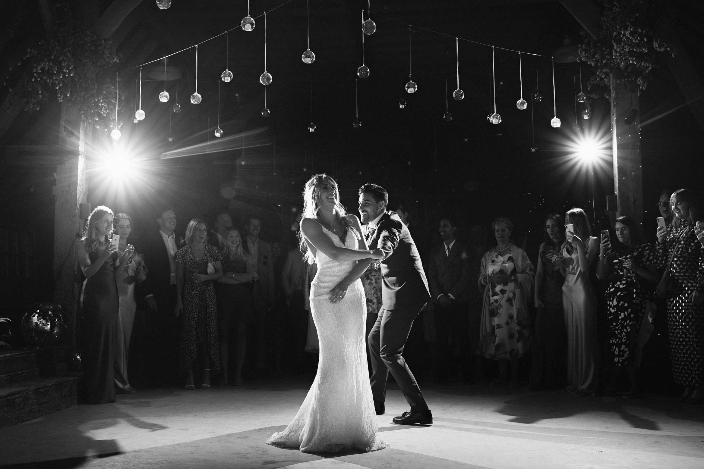 Documentary Kent Wedding Photography of bride and groom on the dance floor at their festival themed wedding in Kent