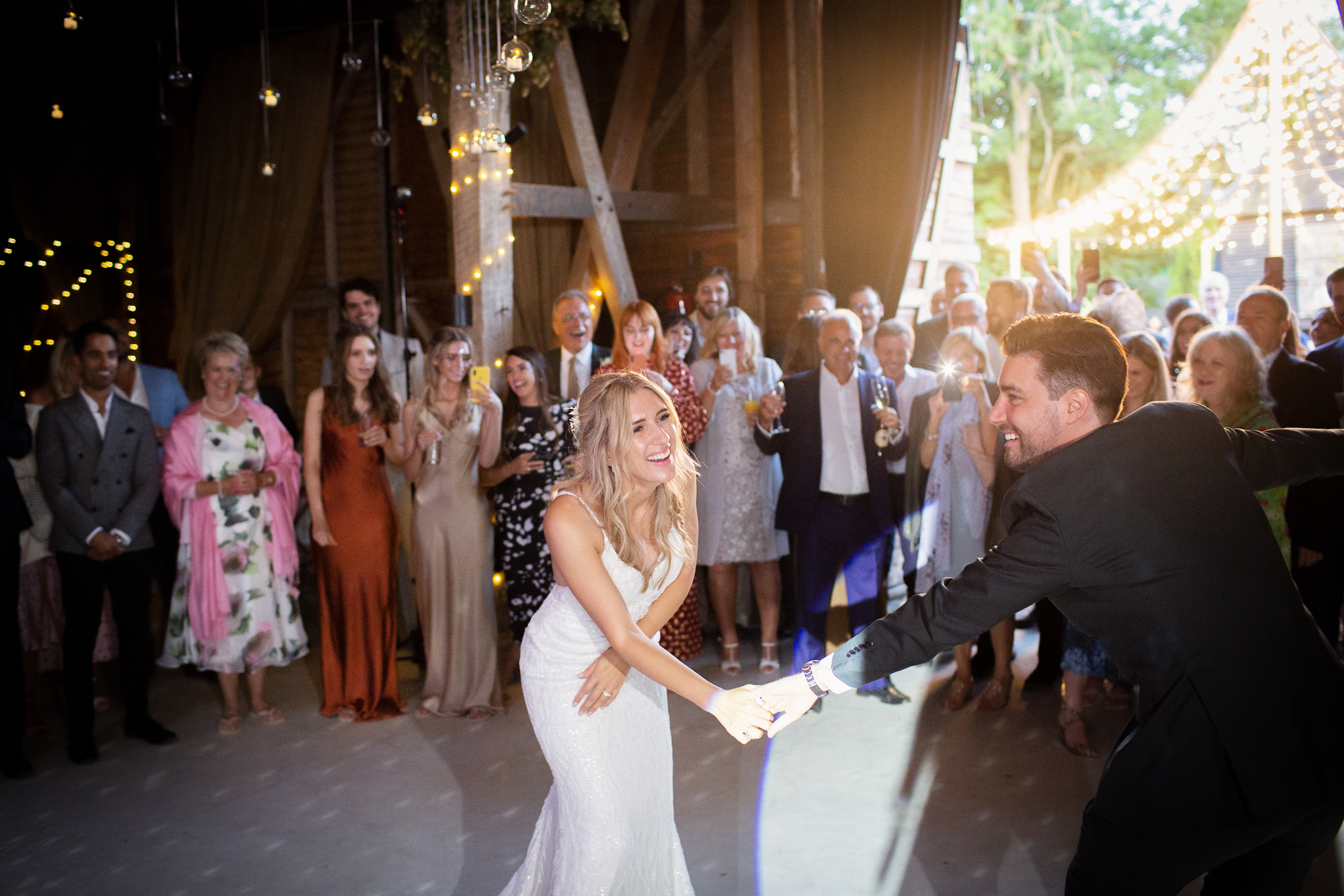 Bride and groom dance at their festival wedding at Preston Court