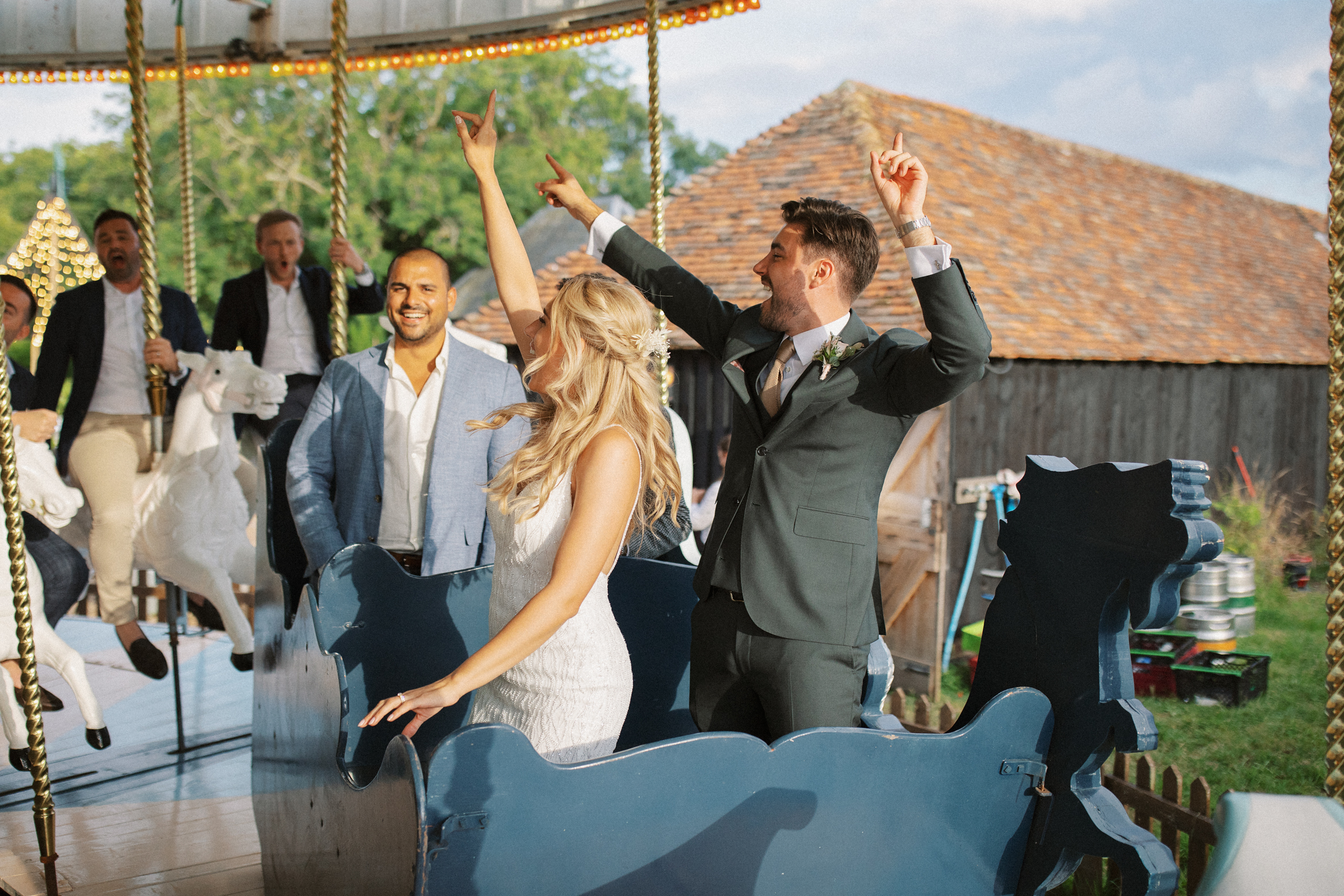 Preston Court Wedding Photography of bride and groom on the Preston Court Carousel