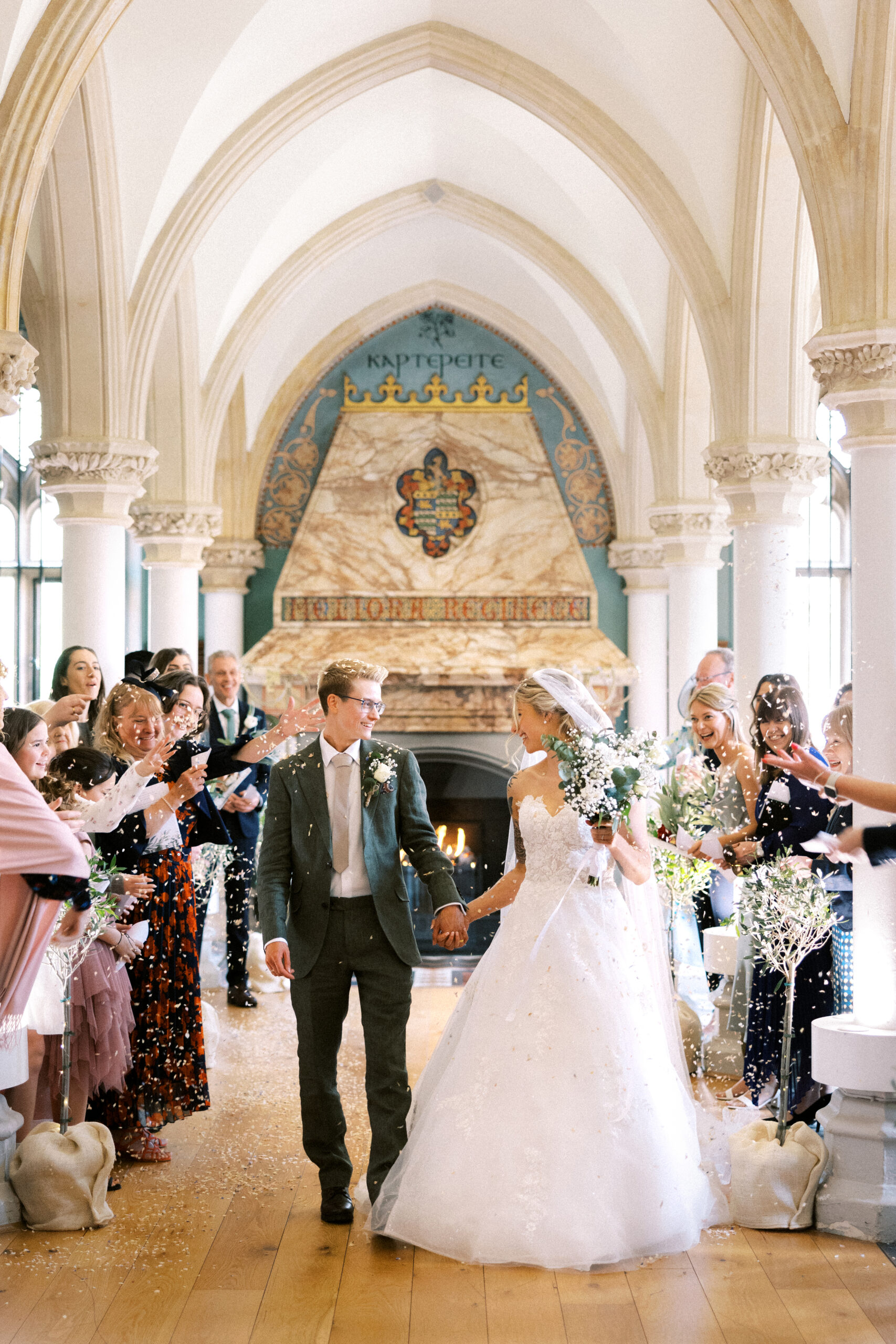 Emotional aisle moment during a Surrey countryside wedding ceremony
