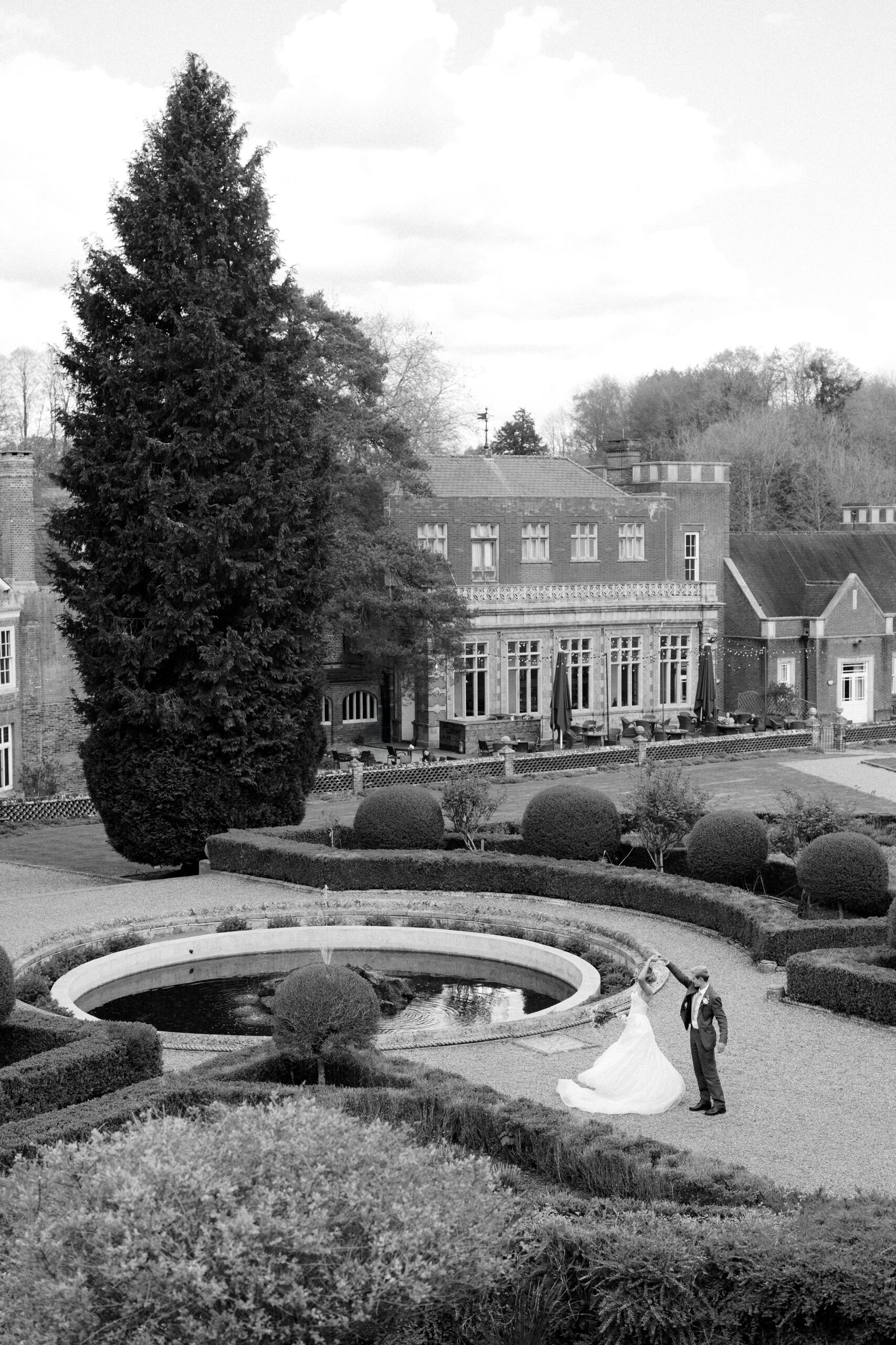 Bride and groom outside Wotton House Country House in Dorking