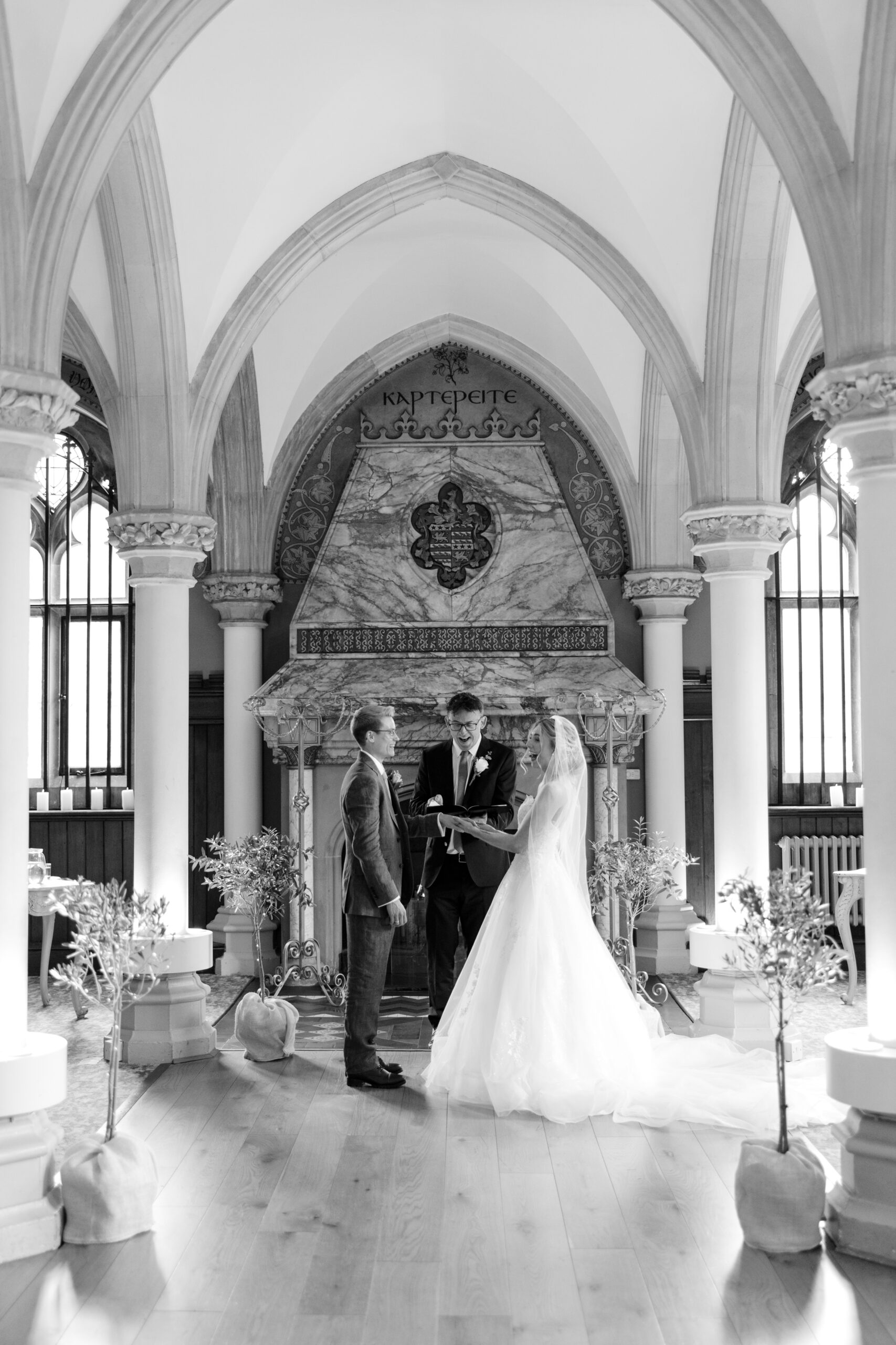 Emotional aisle moment during a Surrey countryside wedding ceremony
