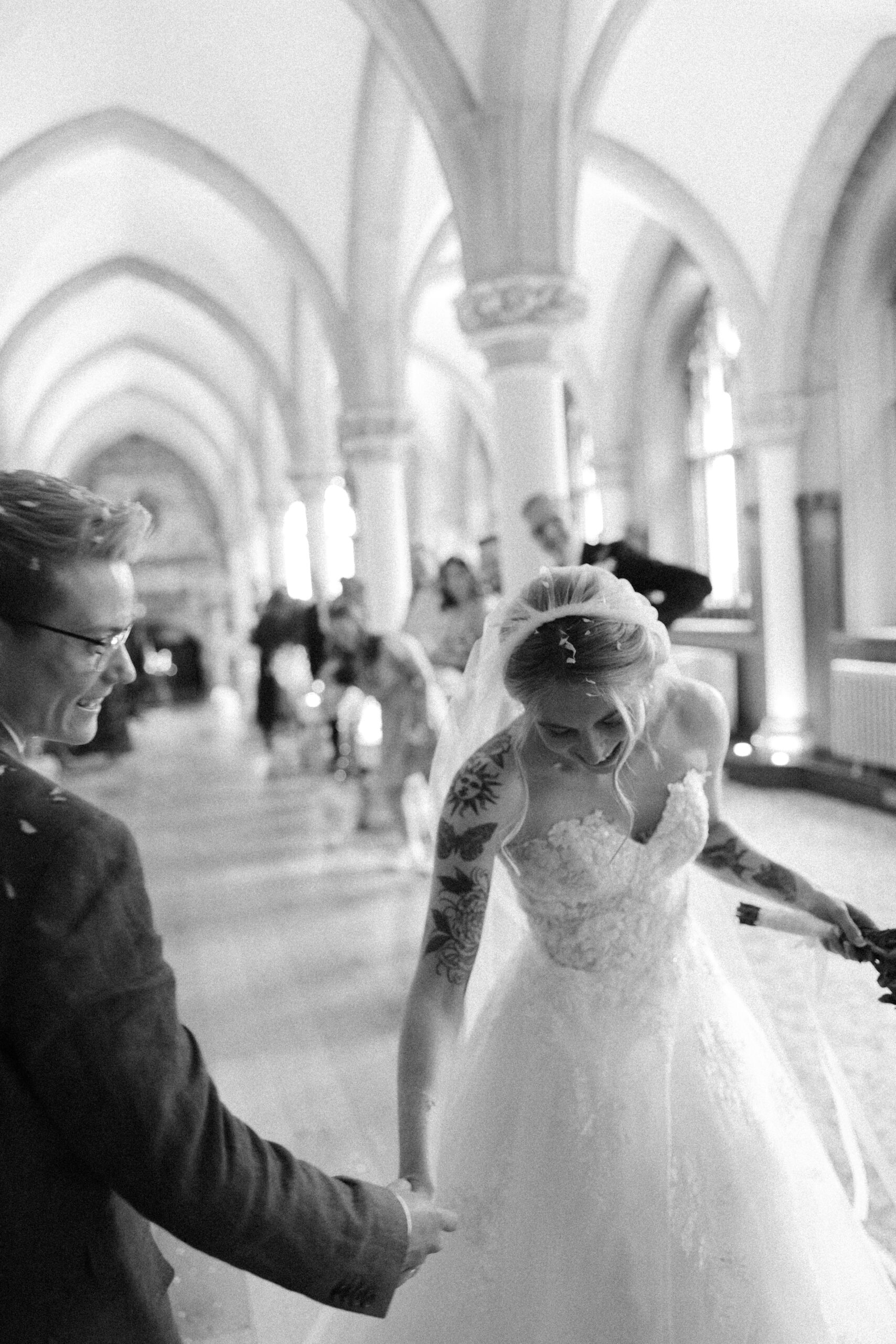 Documentary styled photography of couple exiting their Wotton House Wedding
