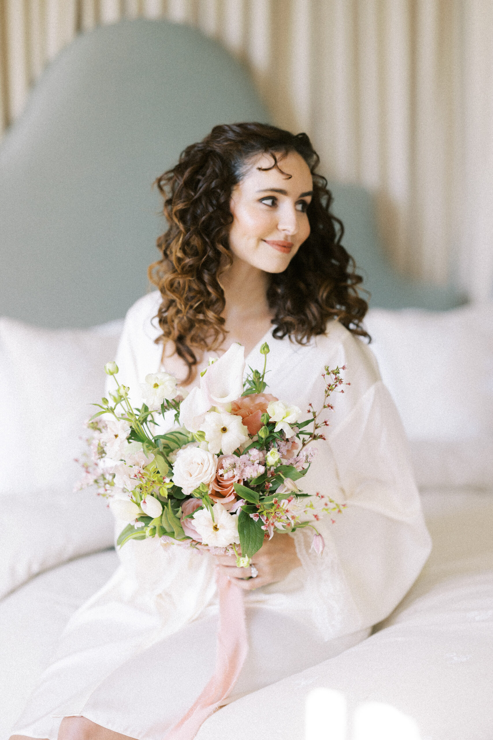 Bride getting ready in the morning light at Findon Place, photographed by a Findon Place wedding photographer