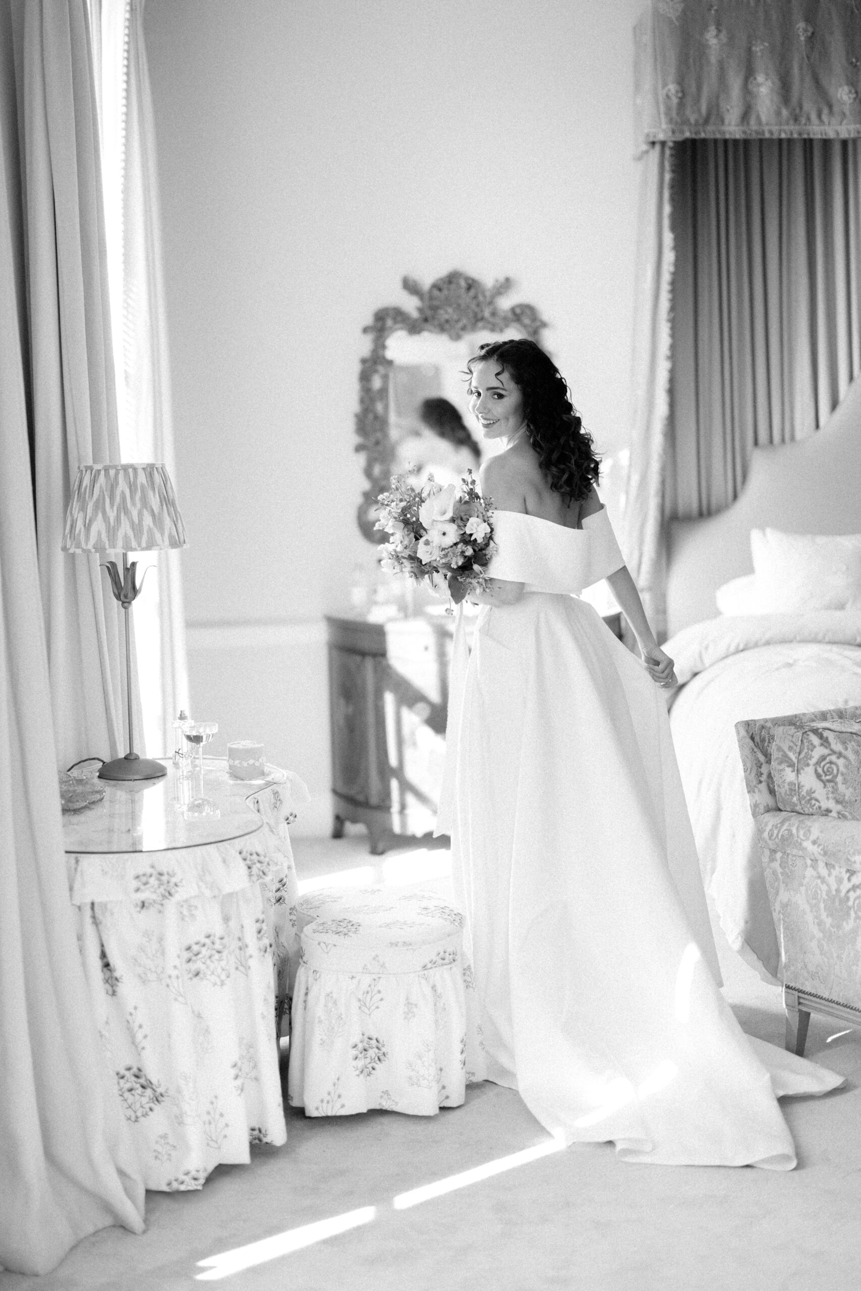 Romantic window light portrait of the bride at Findon Place
