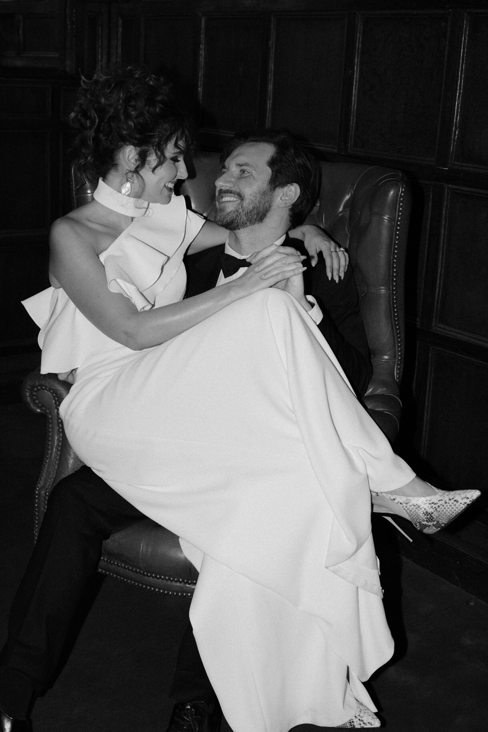 Editorial-style evening flash photo of bride and groom at Findon Place