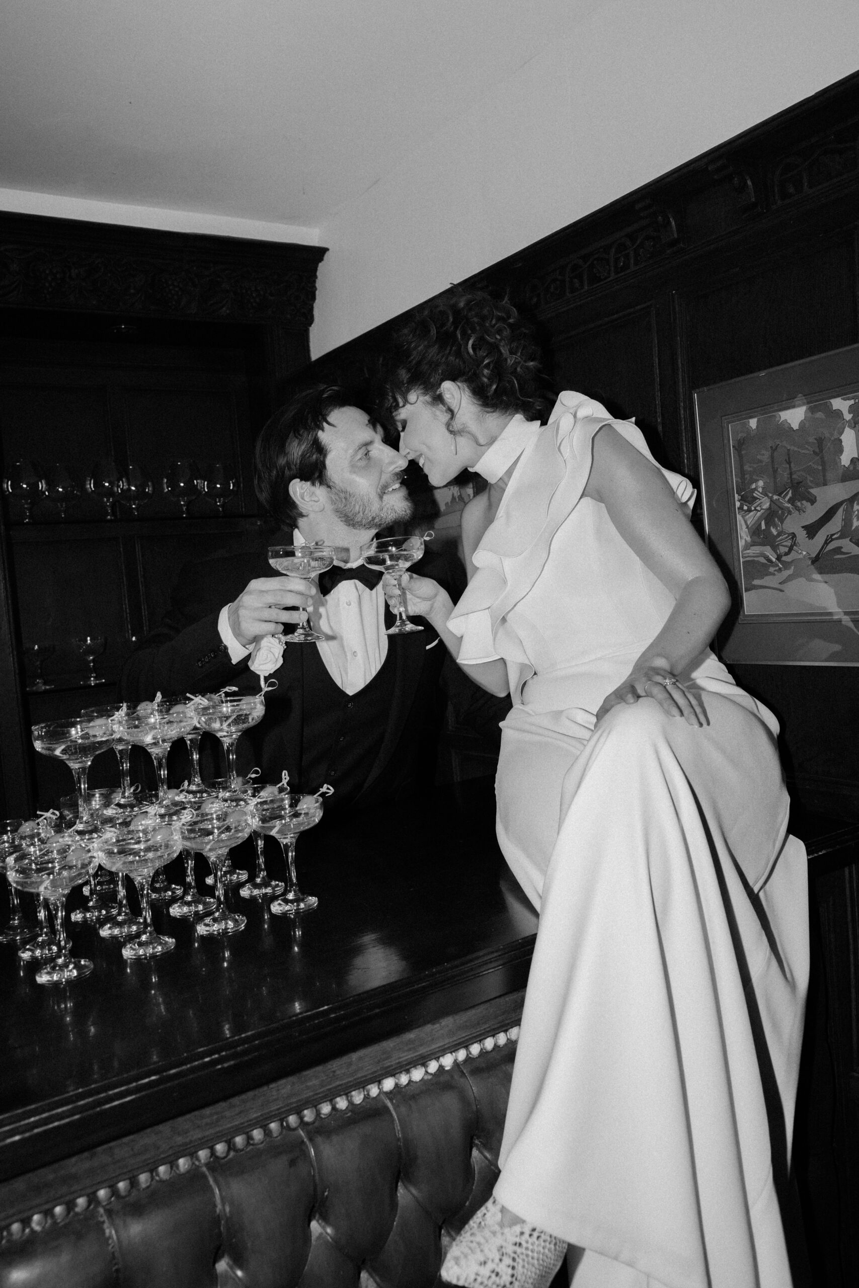 Dramatic flash portrait of bride and groom in the basement at Findon Place