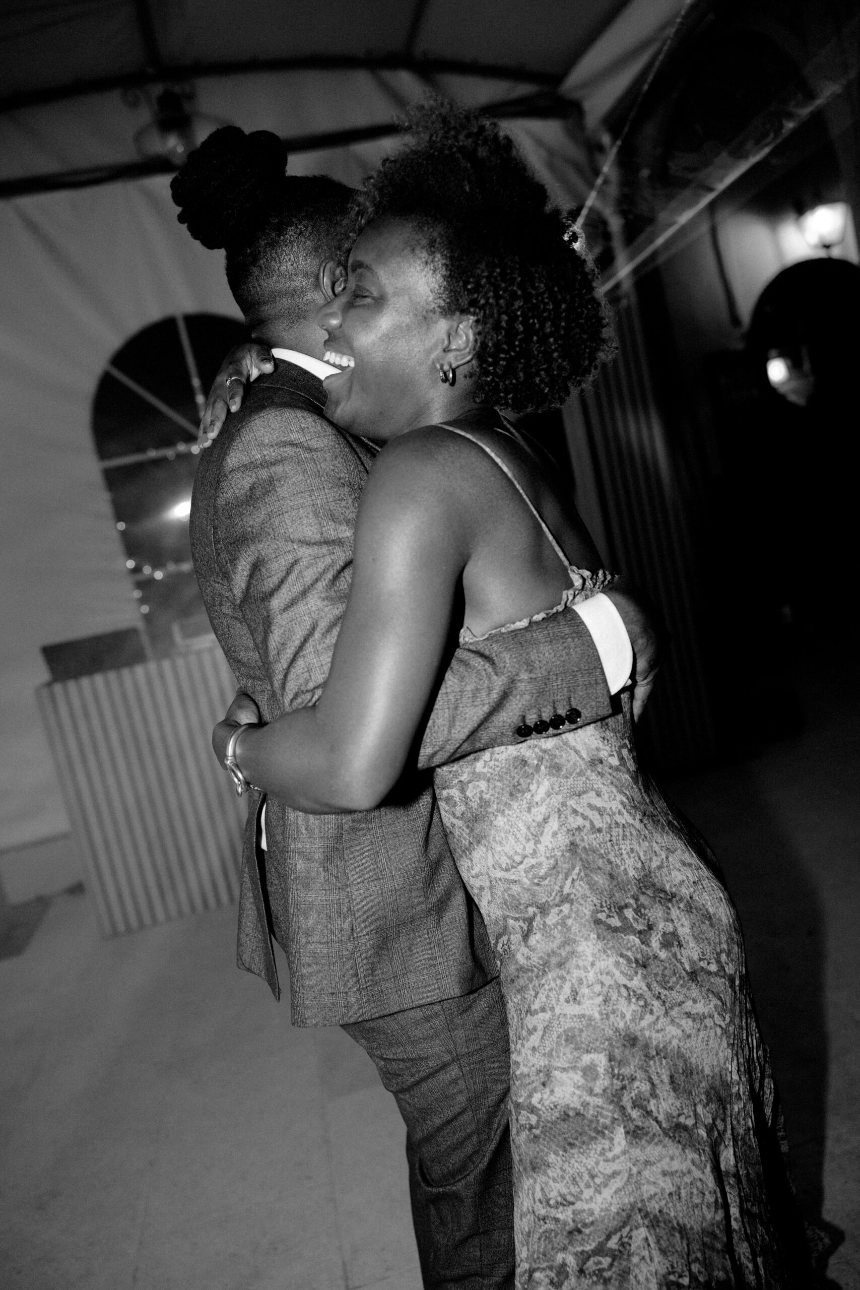 Family and friends dancing together at Chateau de Valmousse during a luxury destination wedding