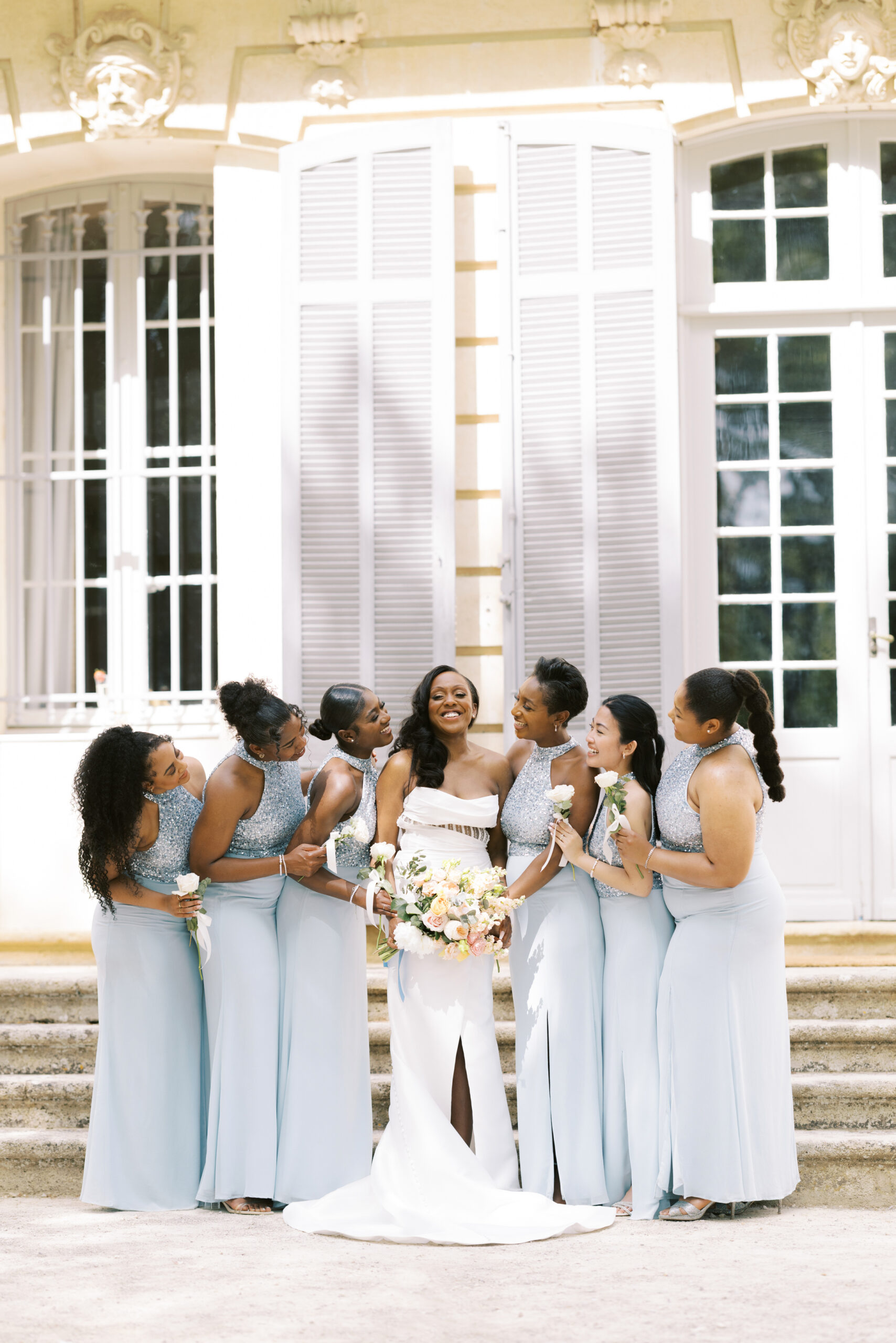 Bridal party gathered at Chateau de Valmousse photographed by a French destination wedding photographer