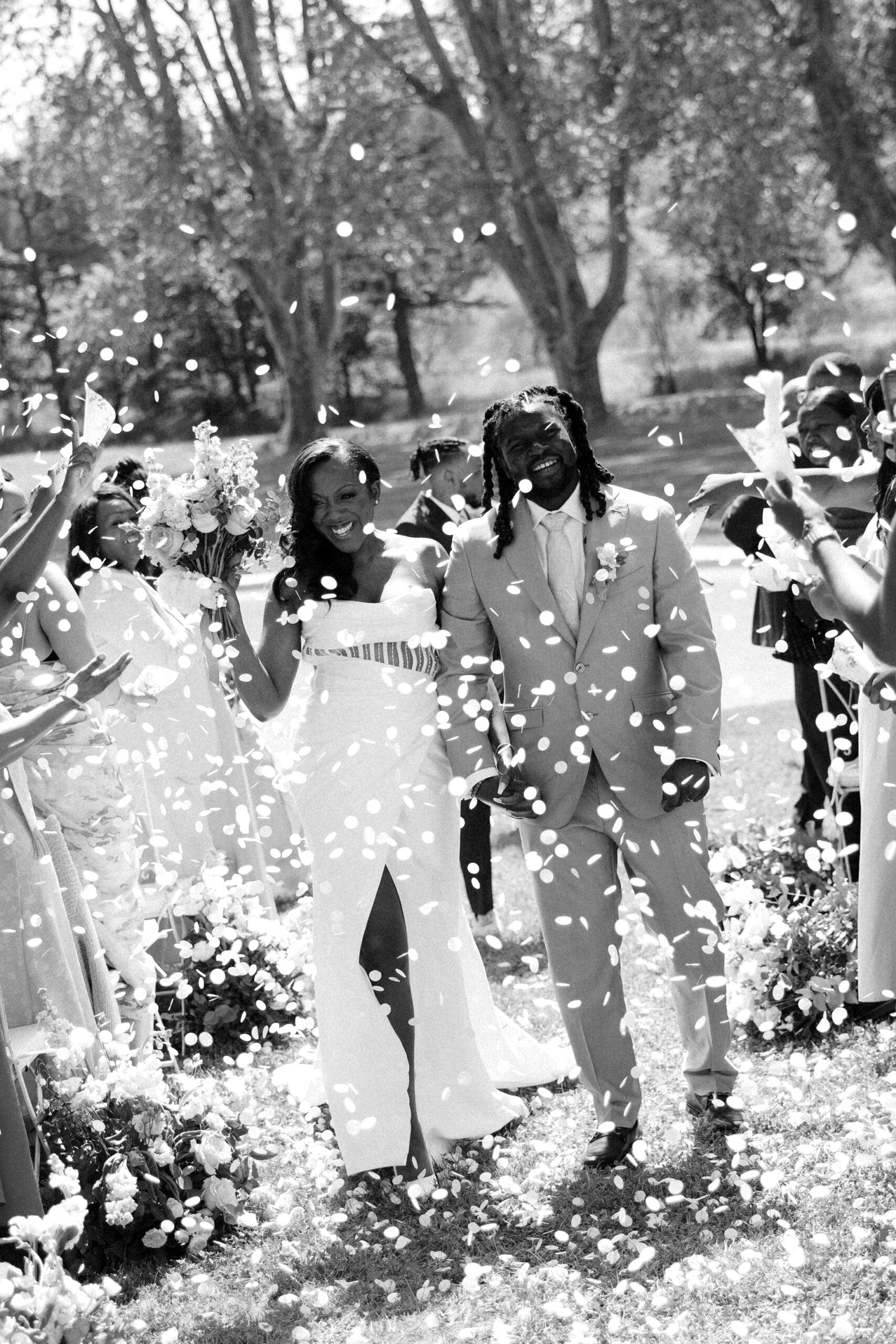 Outdoor ceremony in the gardens of Chateau de Valmousse photographed by a French destination wedding photographer