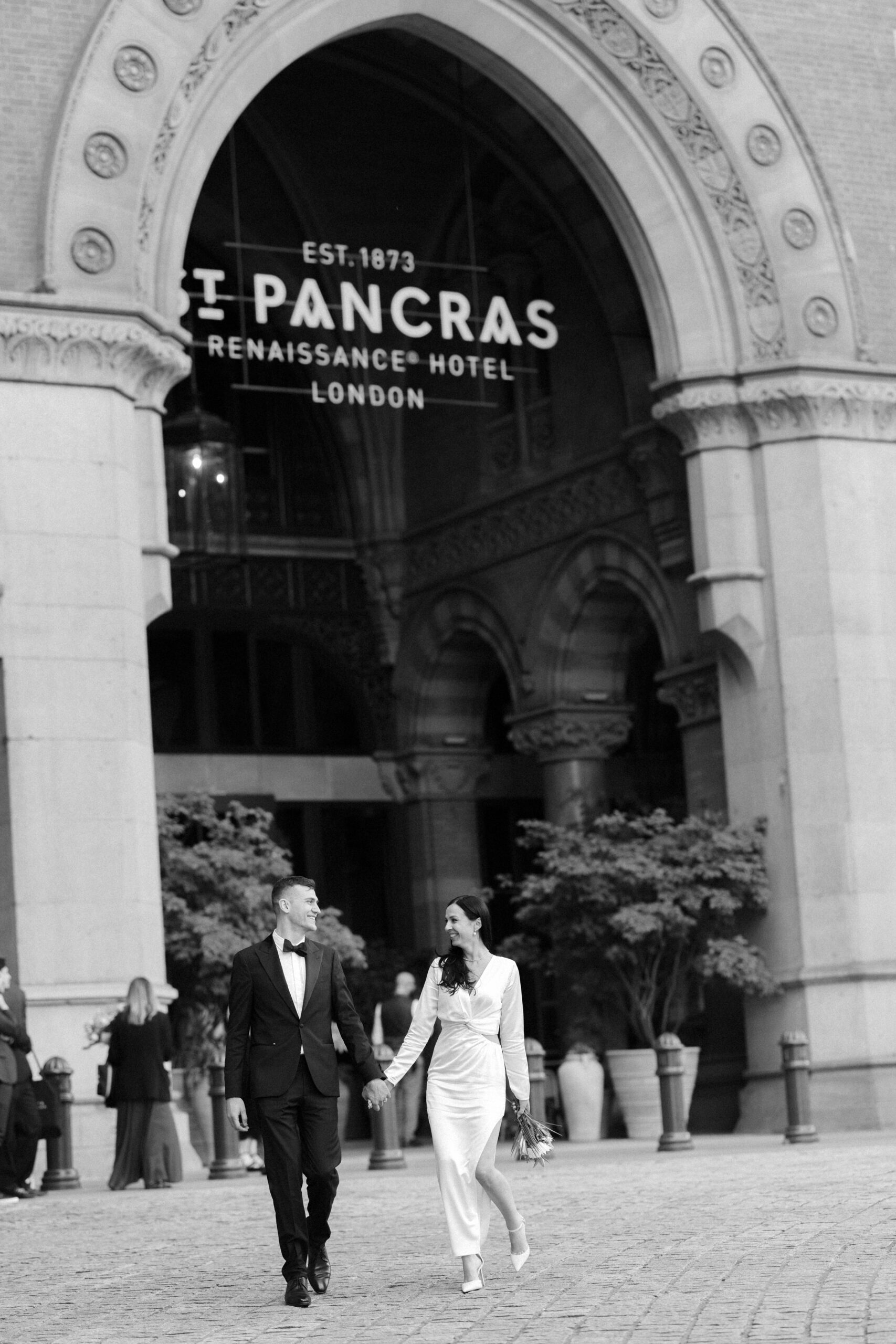 Bride and groom portraits outside St Pancras International in London