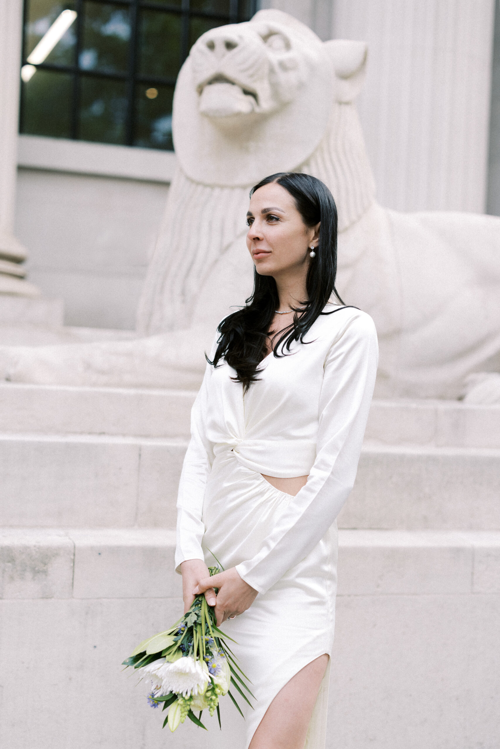 Bride on her wedding day outside Old Marylebone Town Hall in London