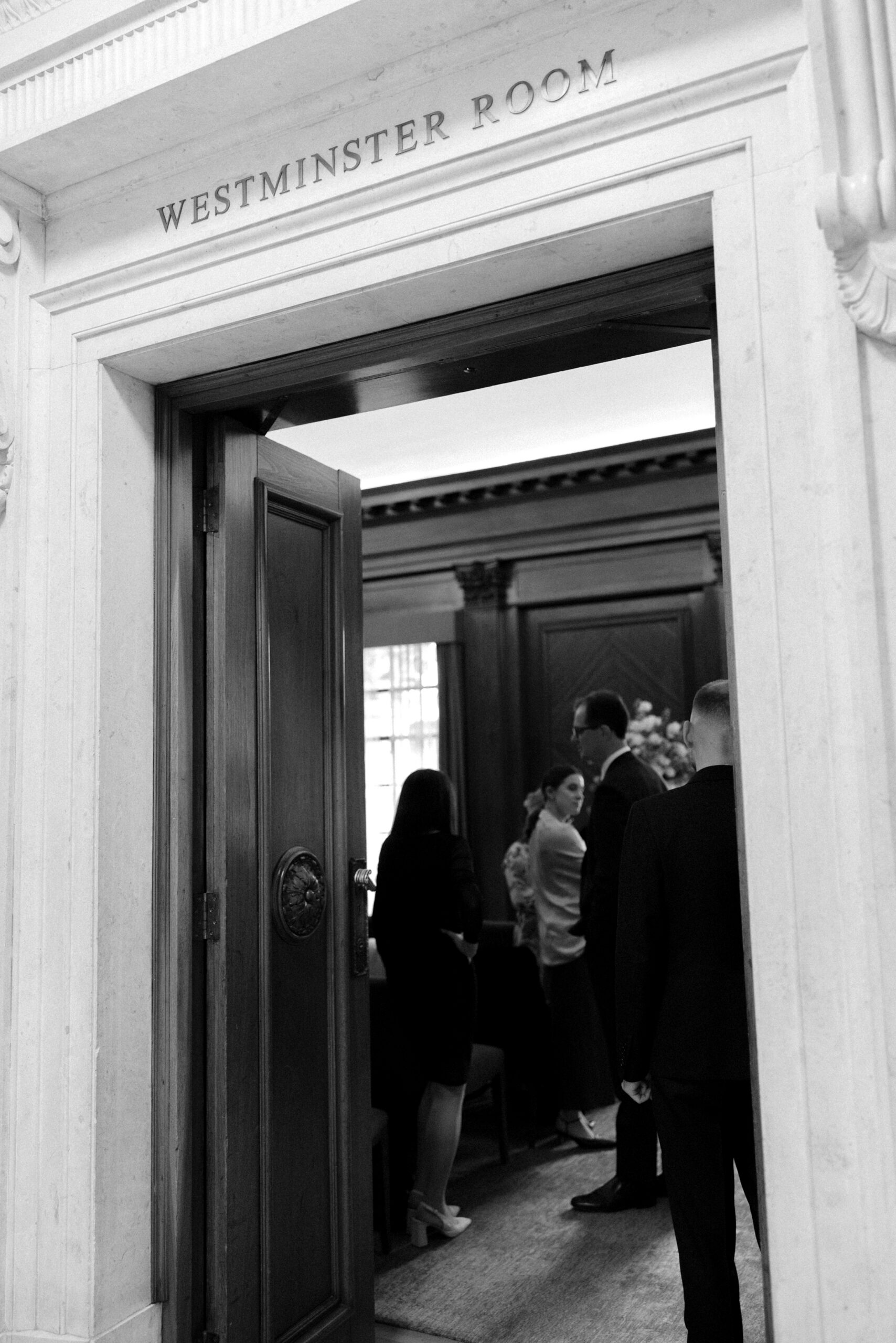 Guests wait at the Westminster Room at Old Marylebone Town Hall for a legal wedding ceremony