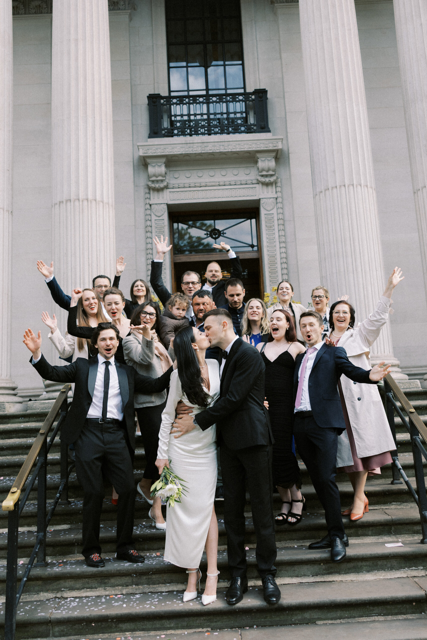 Guests celebrating outside Old Marylebone Town Hall after the ceremony