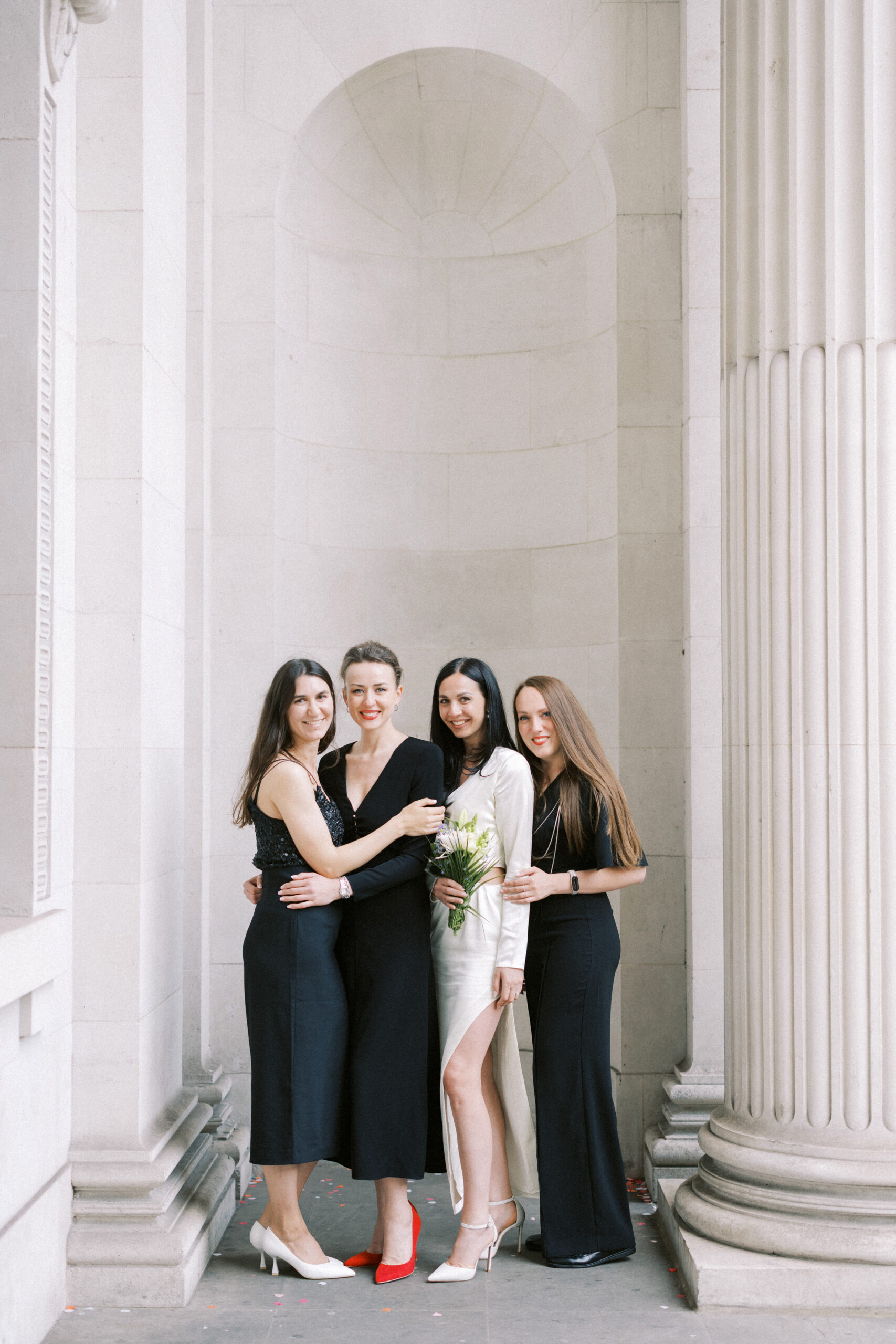 Old Marylebone Town Hall wedding photography of bridesmaids outside on the steps